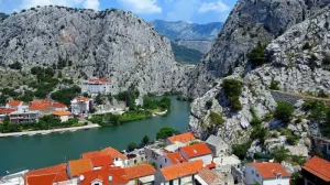 The Cetina River flows through Omis into the Adriatic Sea.